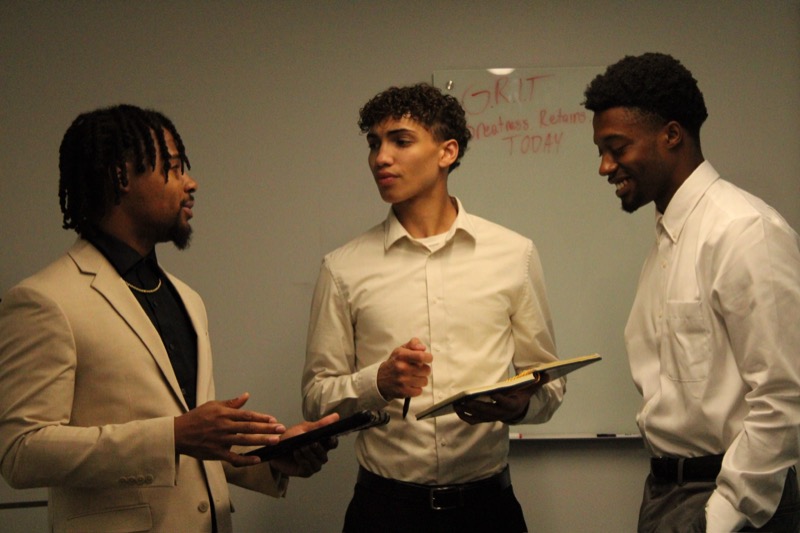 Next Gen Exposure Inc team members in professional discussion — view on Instagram