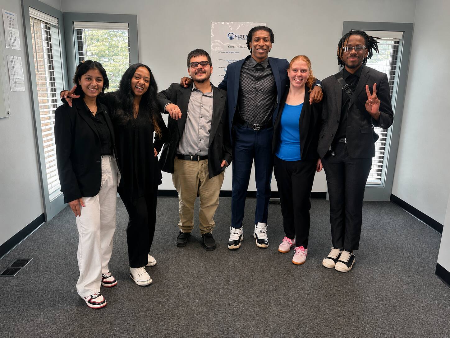 Next Gen Exposure Inc team members together at the Kalamazoo office
